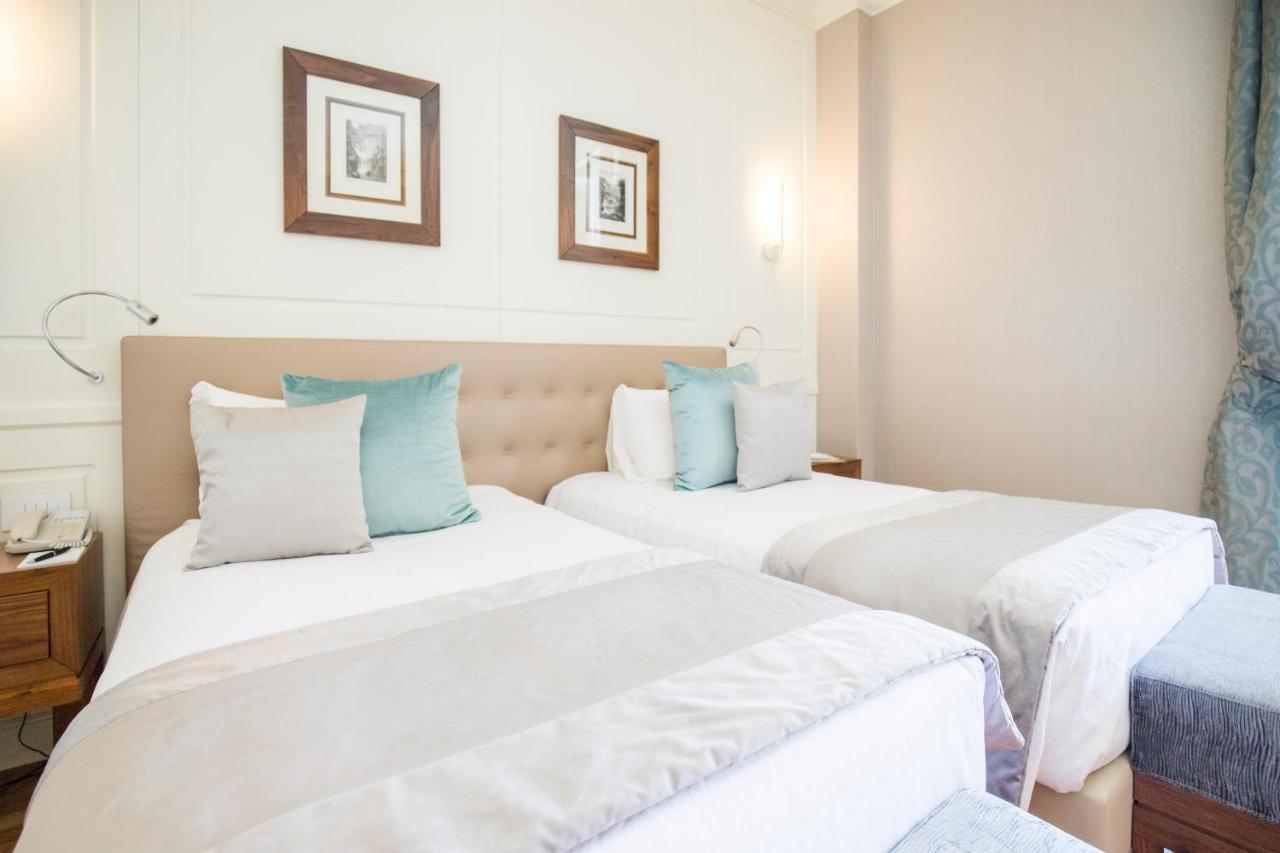 Grand Hotel Terme Σιρμιόνε Εξωτερικό φωτογραφία A bedroom at the hotel